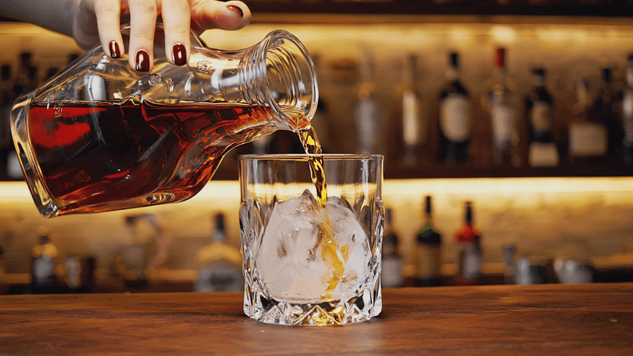A cocktail being poured